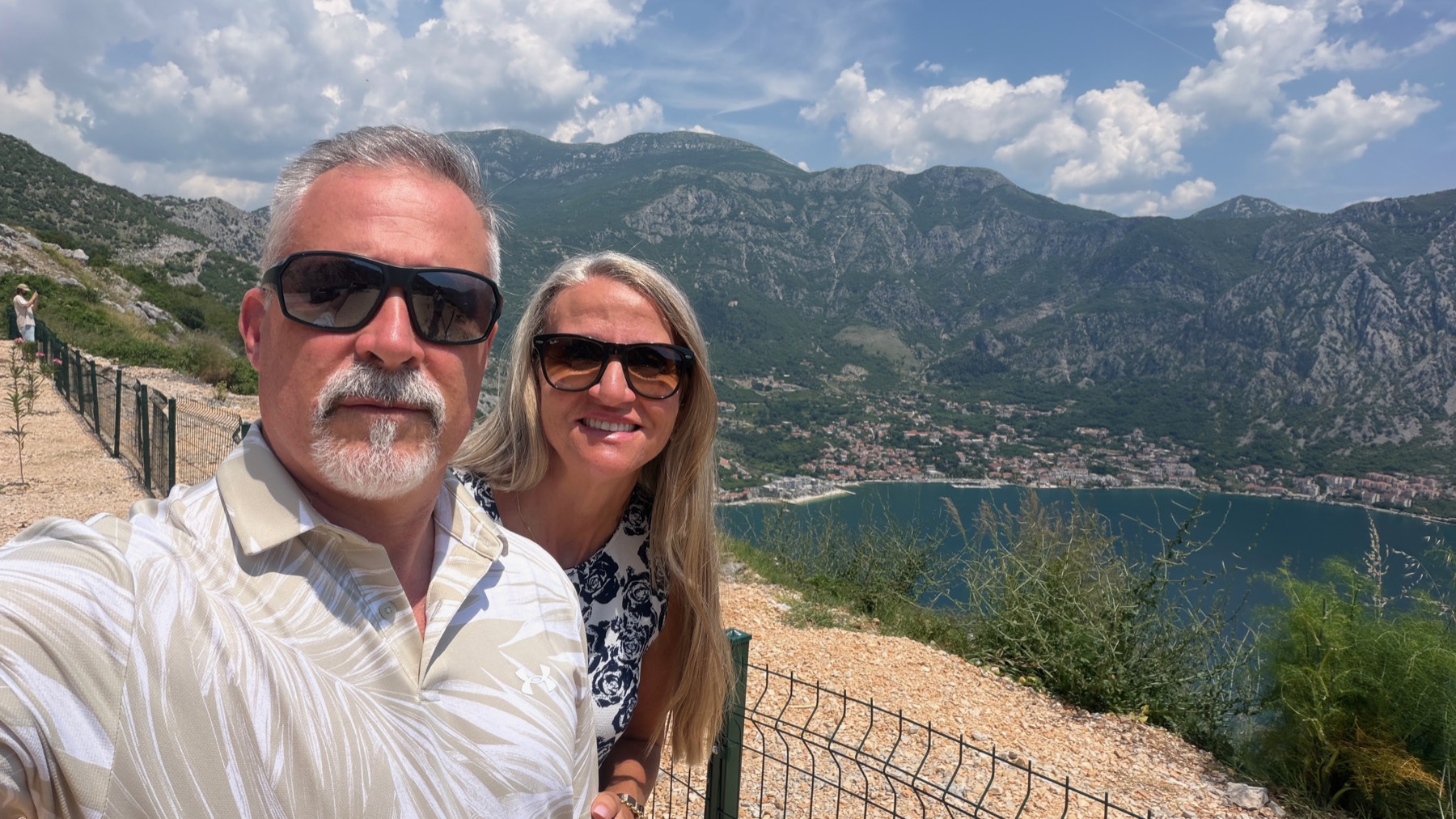 Chuck and Connie Holton on a hillside above the Bay of Kotor, Montenegro