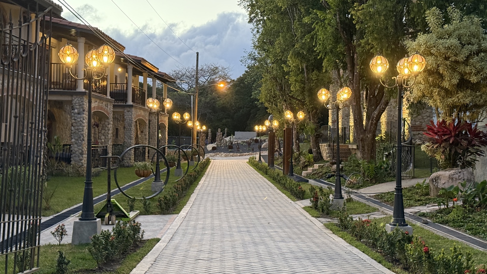 Lit hotel pathway at dusk, Panama